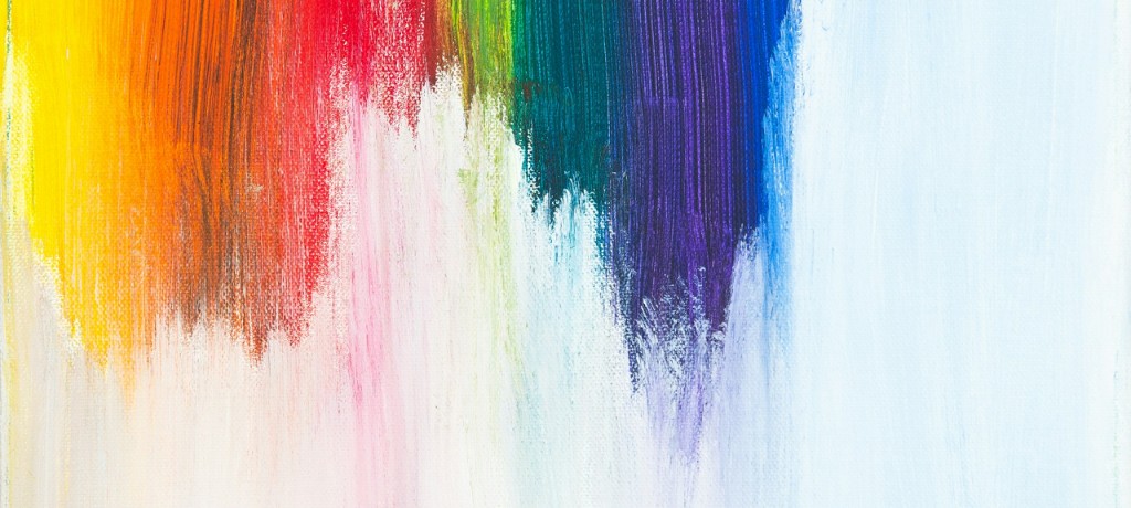 Wide abstract banner with colorful vertical brushstrokes on a light canvas.